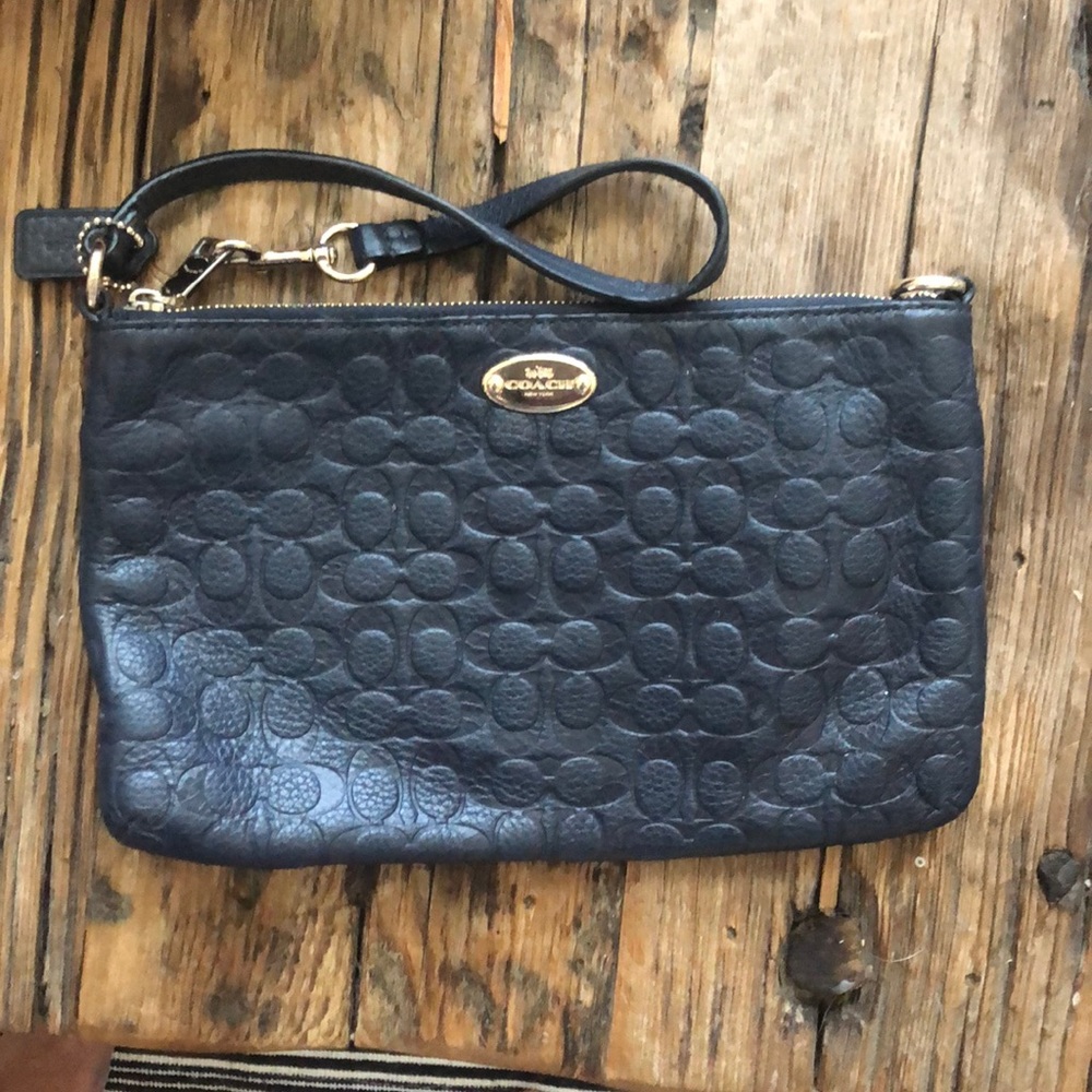 Coach wristlet eggplant color
